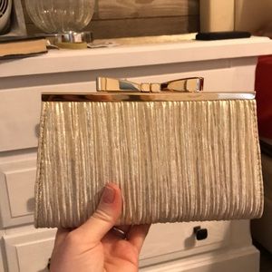 Super cute gold clutch BN